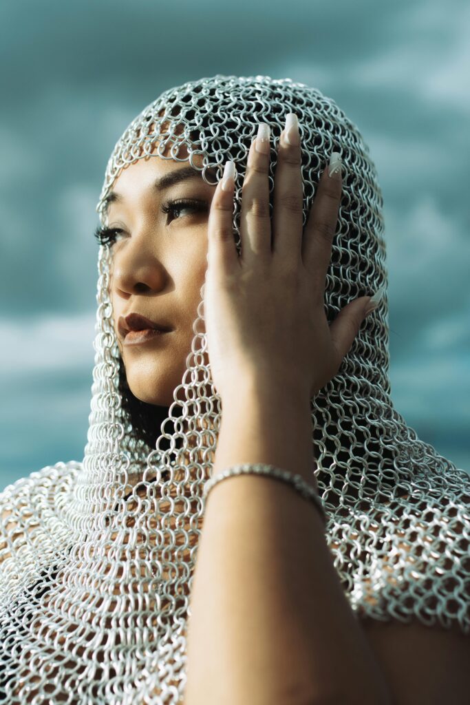 girl wearing a silver head jewelry 